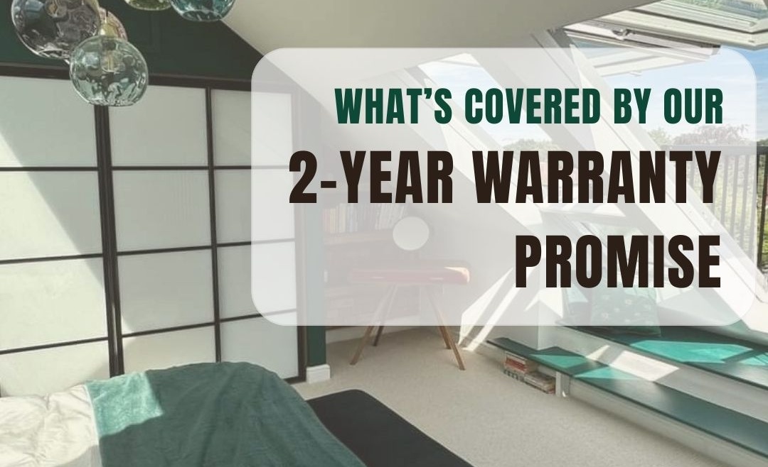 Modern attic bedroom with green accents, natural light, and glass pendant lighting