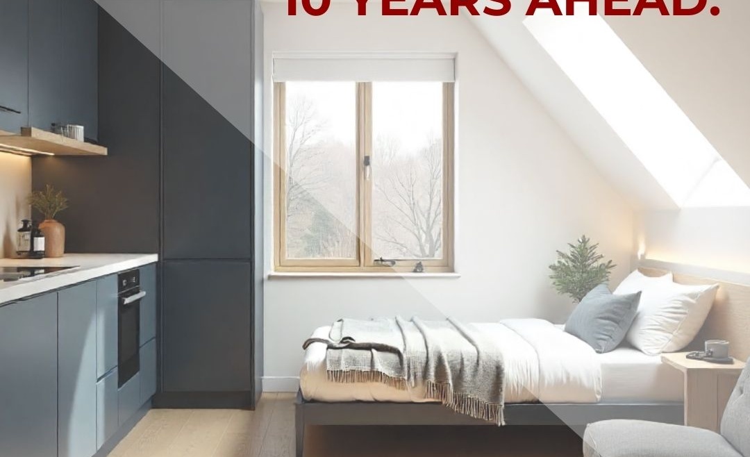 Modern attic conversion with natural light and a multifunctional bedroom space, designed for flexible family living over the next decade.