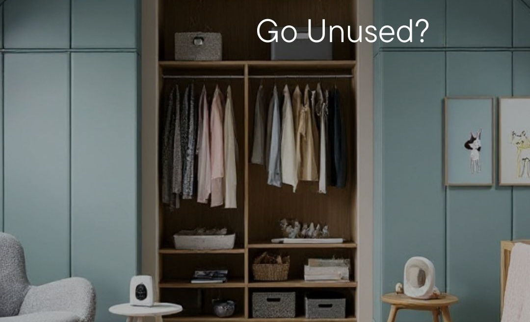 Modern attic home office with skylight, fitted shelving, desk, and natural daylight.